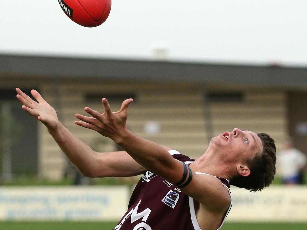 Ballarat: Harrison Hanley keeps his eye on the ball for Melton. Picture: Hamish Blair