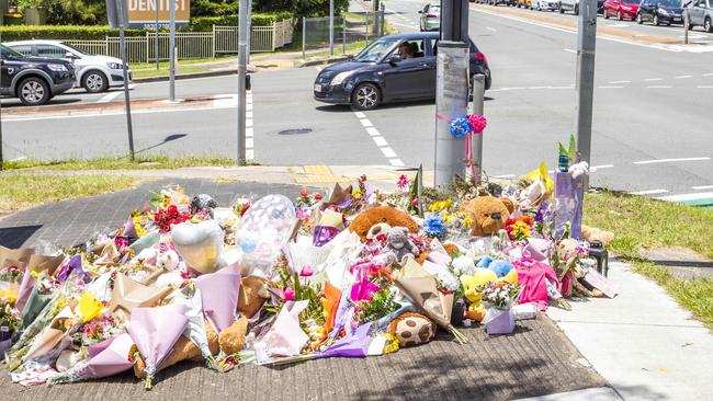 Flowers left for Kate Leadbetter and Matt Field at the intersection of the 2021 Australia Day tragedy. Picture: Richard Walker