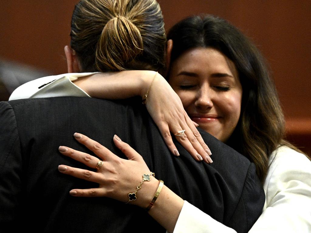 Attorney Camille Vasquez embraces US actor Johnny Depp in the courtroom at the Fairfax County Circuit Courthouse in Fairfax, Virginia. Picture: Brendan Smialowski/AFP