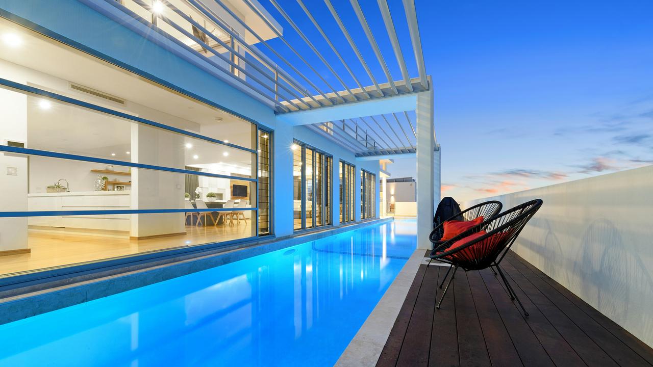 This stunning Kings Beach mansion at 15B Burgess Street is being marketed by Henzells with offers over $7m being sought.