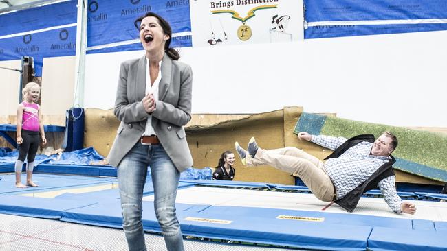 Sports Minister Jane Howlett enjoys the spectacle of Liberal candidate for Lyons John Tucker coming a cropper on the trampoline at the gymnastics funding announcement. Picture: Eddie Safarik