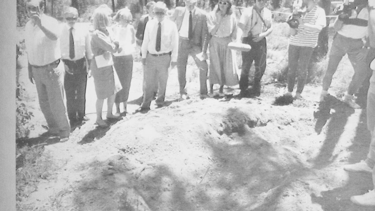 Reporters surround one of the shallow graves of the Birnies’ murder victims outside Perth.