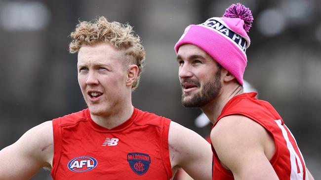 Melbourne training at GoschÃs Paddock. 25/07/2021.  Clayton Oliver and Joel Smith of the Demons  at training today    .  Pic: Michael Klein