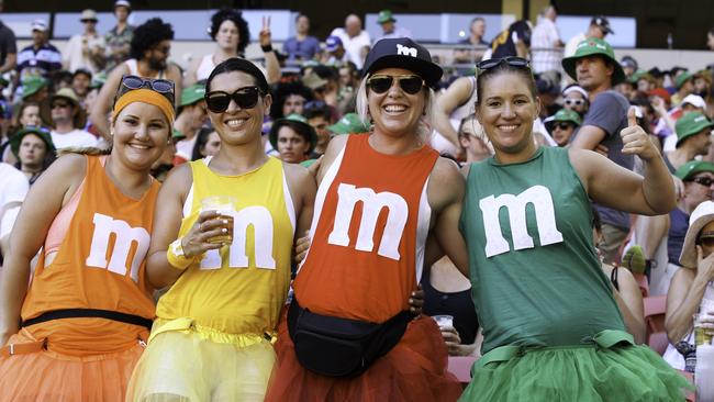 Fans dressed as M&amp;Ms.