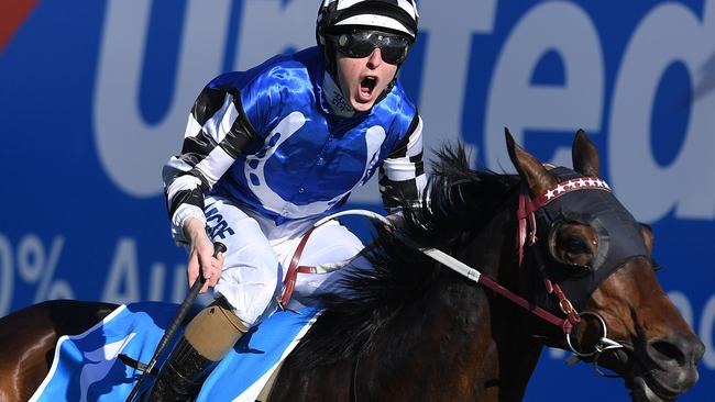 Damian Lane reacts after riding Tosen Stardom to victory in the United Petroleum Toorak Handicap on Caulfield Guineas Day at Caulfield racecourse in Melbourne, Saturday, October 14 , 2017. (AAP Image/Julian Smith) NO ARCHIVING, EDITORIAL USE ONLY