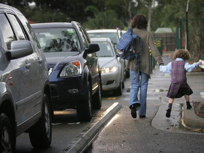 Cars queuing to pick up their children at Pittwater House School. File picture: Manly Daily Collaroy.