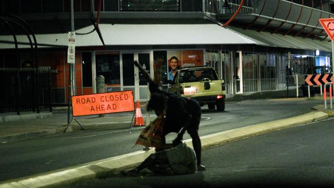 Nightmarish night-time scenes on the streets of Alice Springs.