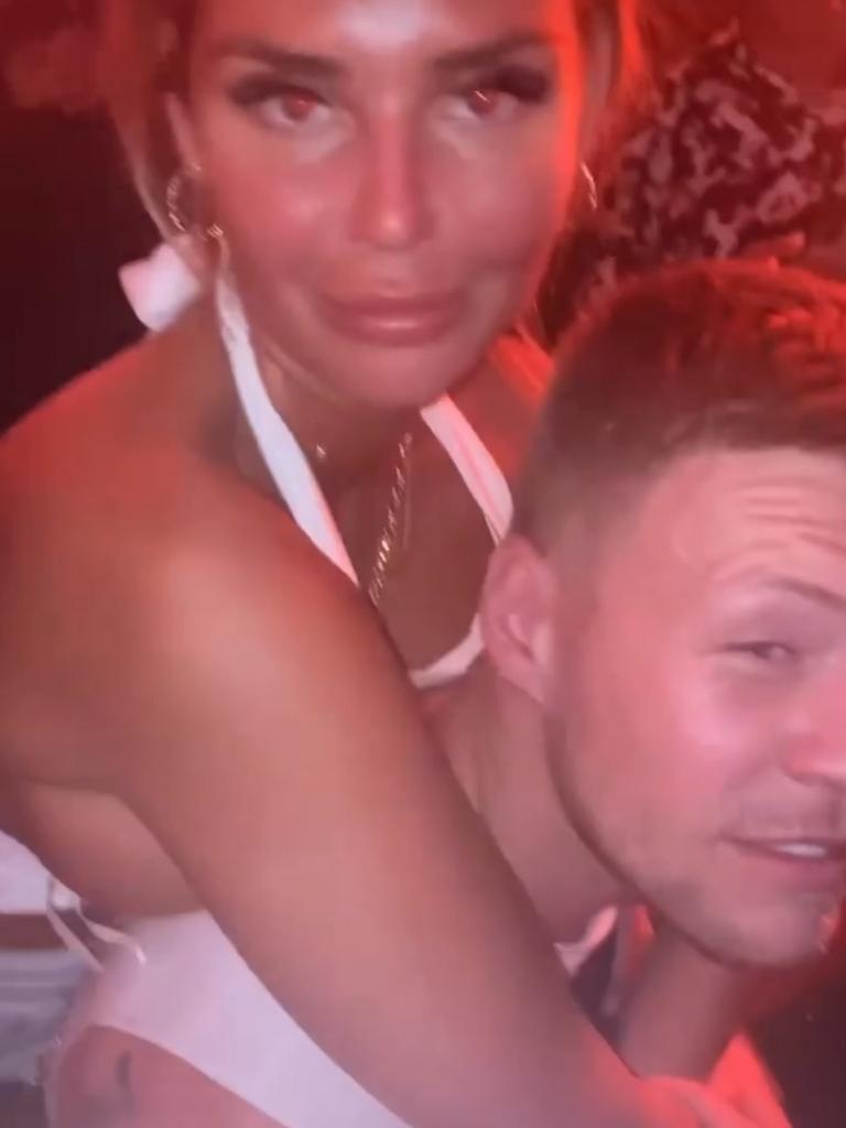 De Goey gets cuddly with a mystery woman in Bali. Picture: Instagram