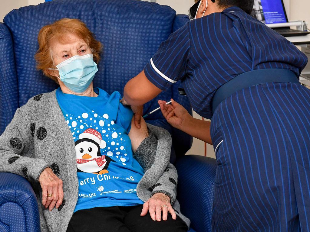 Nurse May Parsons administers the Pfizer/BioNtech COVID-19 vaccine to Margaret Keenan, a 90-year-old who became the UK’s first person to receive the jab. Picture: AFP