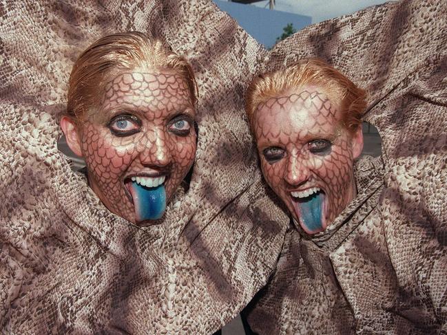 Frill-necked lizards Rose Chafer and Sonia Newnham ahow off their costumes in 1997.