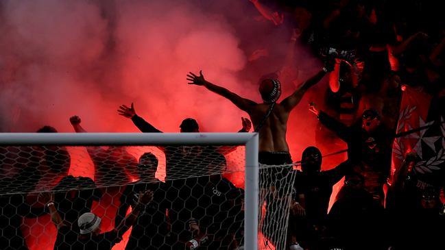 SYDNEY, AUSTRALIA - FEBRUARY 08: Wanderers fans let off a flare during the round 18 A-League Men match between Sydney FC and Western Sydney Wanderers at Allianz Stadium, on February 08, 2025, in Sydney, Australia. (Photo by Brendon Thorne/Getty Images)