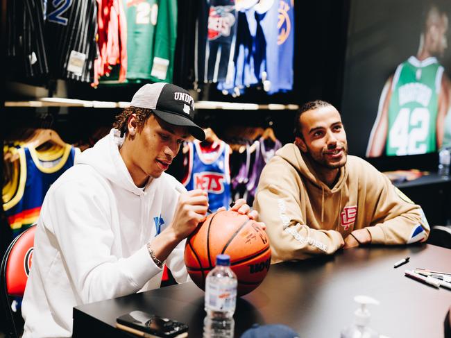 Dyson Daniels and Xavier Cooks in Melbourne meeting with fans. Picture: NBA