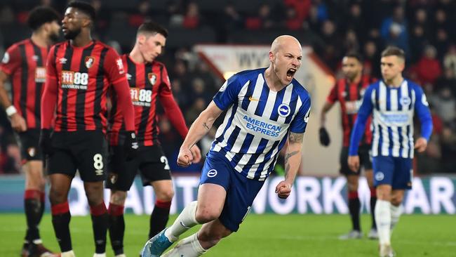 Aussies Aaron Mooy and Mat Ryan are engaged in a tough relegation battle.