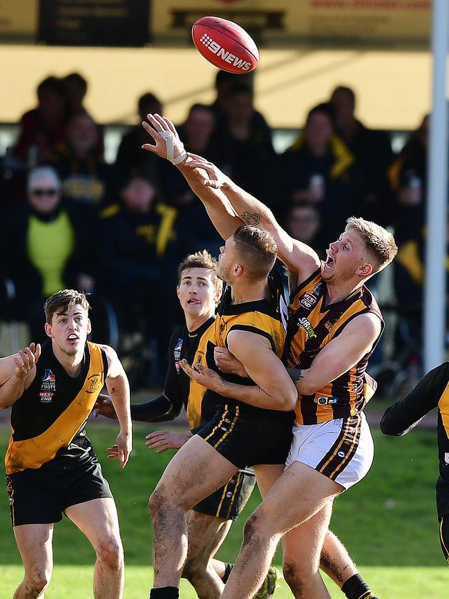 Josef Rack rucks against Modbury last season. Rack has left the Tigers for Kilburn, Picture: AAP/Mark Brake