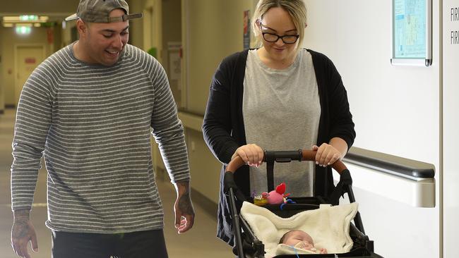 Newborn girl Rylee Gardner, pictured with dad Logan Gardner and mum Amie Rootsey is being transported to Brisbane for treatment after suffering seizures. PICTURE: MATT TAYLOR.