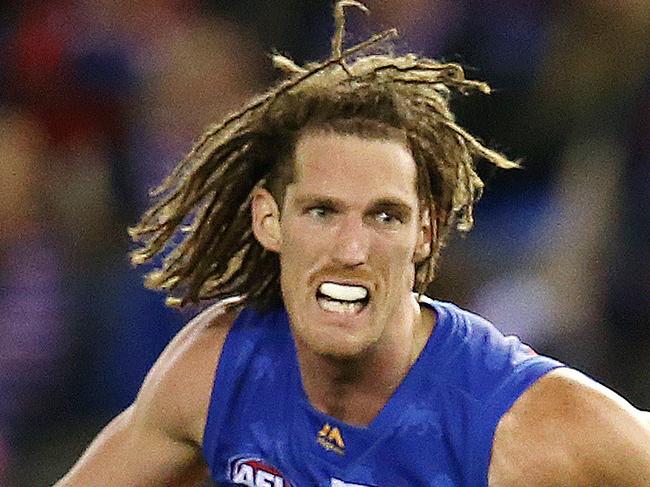 AFL Round 8. 12/05/2018.  Western Bulldogs v Brisbane Lions at Etihad Stadium.  Western Bulldogs Toby McLean leaves Brisbane Lions' Matthew Eagles chasing   . Pic: Michael Klein