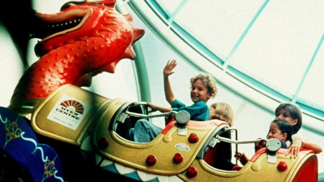 People enjoying the rides at Tops in Myer Centre. Roller coaster, amusement tourism travel theme parks qld