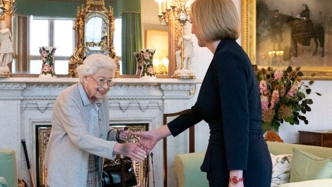 Queen Elizabeth II greets newly elected British Prime Minister Liz Truss as she arrives at the Balmoral Castle in Scotland on Tuesday. Picture: Jane Barlow - WPA Pool/Getty Images