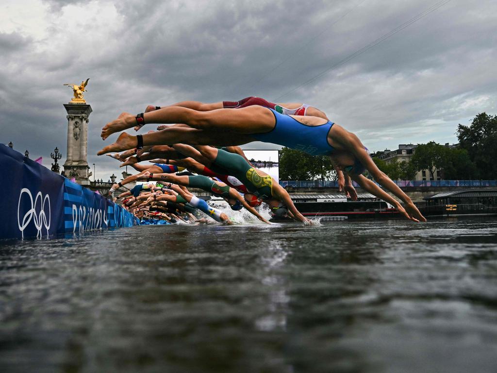 Diving right in: Athletes compete in the swimming race in the Seine during the women’s individual triathlon at the Paris 2024 Olympic Games in central Paris on July 31, 2024. There were concerns about the water quality in the river. Picture: AFP