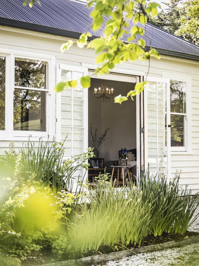 The side view of Home Hill Cottage from the peaceful garden. Picture: Joe Chelkowski