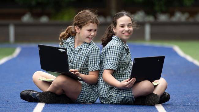 Ava Holdsworth and Chloe Carlyon are chuffed with NAPLAN results at St Finbar’s Primary School in Brighton East. Picture: Nicki Connolly