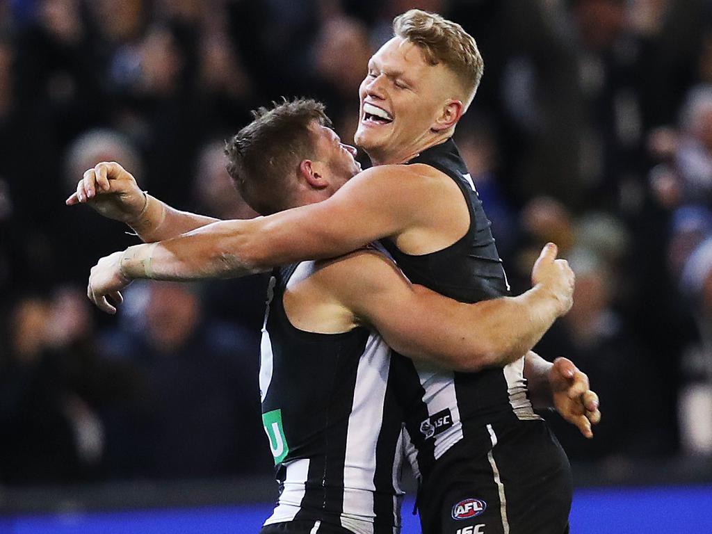 Adam Treloar celebrates on the siren with Taylor Adams during AFL Semi Final match between the GWS Giants v Collingwood at the MCG. Picture. Phil Hillyard