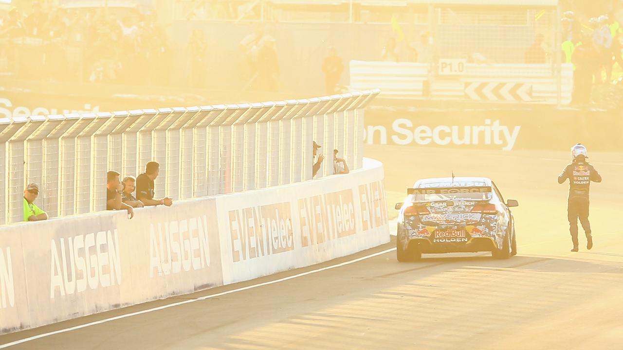 Jamie Whincup walks away from his car after running out of fuel on the last lap during the 2014 Bathurst 1000. Picture: Mark Kolbe/Getty Images