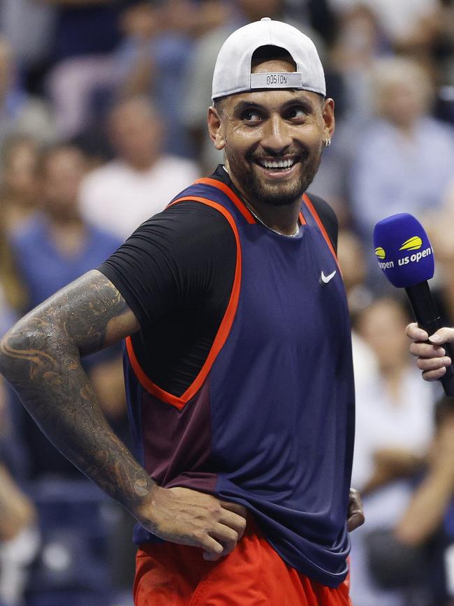 Nick Kyrgios soaks up his win over Daniil Medvedev.