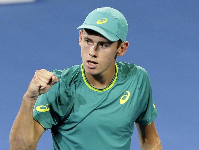 Alex De Minaur of Australia reacts after winning the first set in his match against Milos Raonic of Canada during the Brisbane International tennis tournament in Brisbane, Australia, Wednesday, Jan. 3, 2018. (AP Photo/Tertius Pickard)