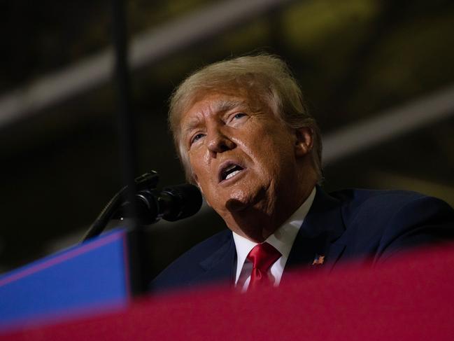 WARREN, MI - OCTOBER 01: Former President Donald Trump speaks during a Save America rally on October 1, 2022 in Warren, Michigan. Trump has endorsed Republican gubernatorial candidate Tudor Dixon, Secretary of State candidate Kristina Karamo, Attorney General candidate Matthew DePerno, and Republican businessman John James ahead of the November midterm election.   Emily Elconin/Getty Images/AFP