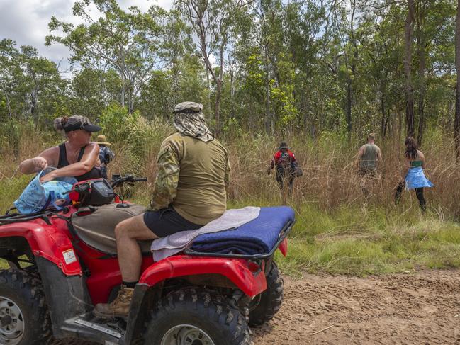 Line searches commence through an unsearched, dense block of land nearby the Humpty Doo Golf Club. Picture: Floss Adams.