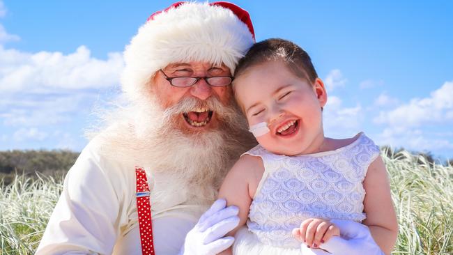 Paige Skarratts with Santa. Photo: Naturally Creative Photography