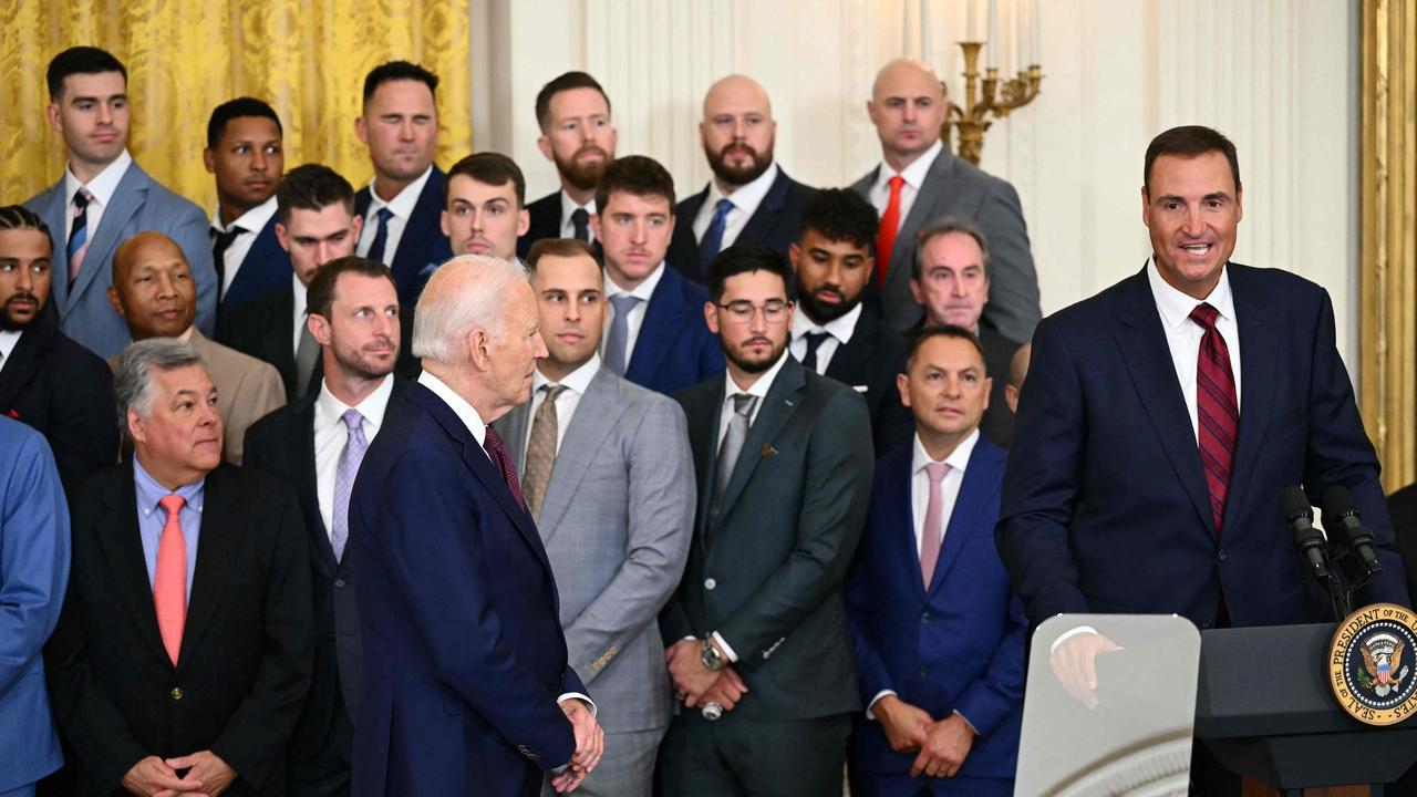 Biden congratulating Rangers general manager Chris Young. Picture: Mandel NGAN / AFP