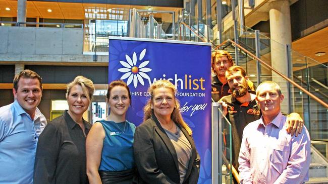 BUSINESS OPPORTUNITIES: Hans De Koning of WishList Sunshine Coast, Jennifer Swaine, Shanna Douglas of RDA, Sunshine Coast Chamber Alliance vice chairperson Linda Delamotte and Brett Frampton of Spotless, with Jared Woodbine and Jason Dobinson of All Tech industrial abseilers on the steps. Picture: Erle Levey