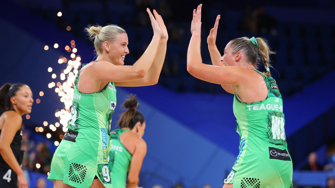 Fever teammates Sasha Glasgow and Alice Teague-Neeld celebrate a goal. Picture: James Worsfold