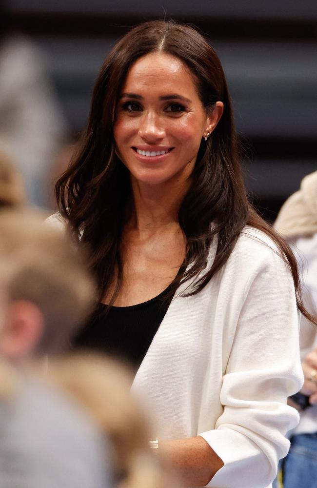 The Duchess of Sussex glows at the Invictus Games. Picture: AFP