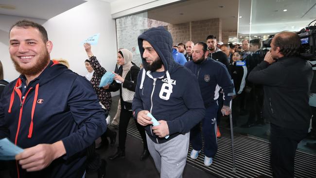 Supporters of Salim Mehajer at the Auburn Council chambers where he was urged to resign last year.