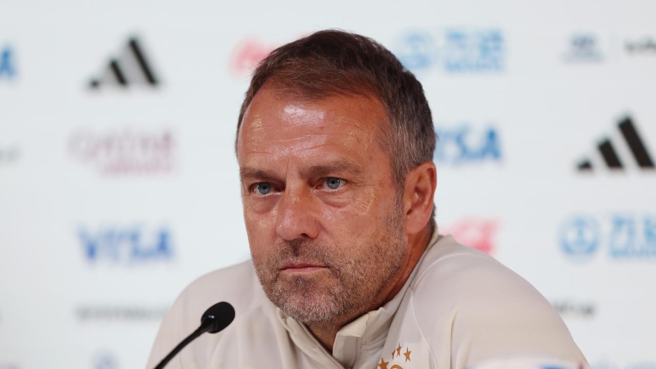 Hansi Flick, Head Coach of Germany, speaks to media. (Photo by Mohamed Farag/2022 Getty Images)