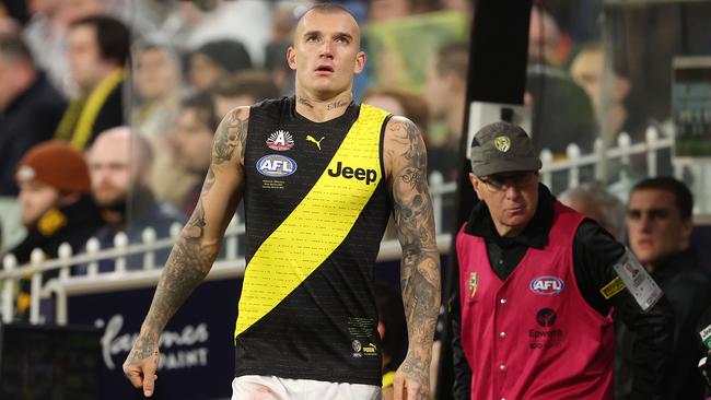 An unhappy Dustin Martin on the bench. Picture: Michael Klein