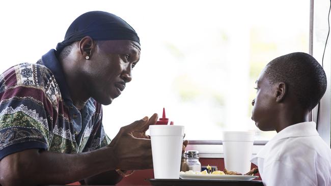 Mahershala Ali, left, and Alex Hibbert in a scene from, Moonlight. Picture: AP