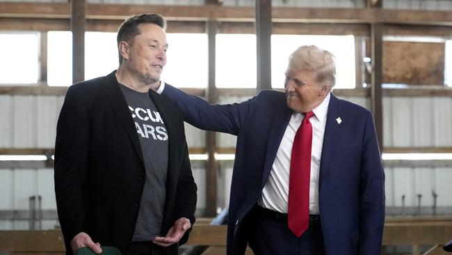 Elon Musk, and Donald Trump on the campaign trail last year. Picture: AP /Alex Brandon