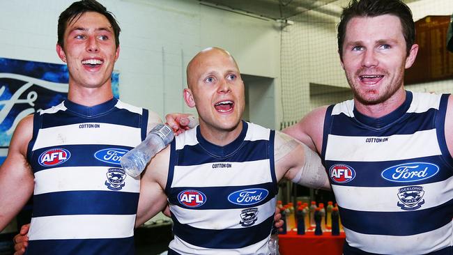 Dangerfield sings the song with his teammates. Picture: Getty