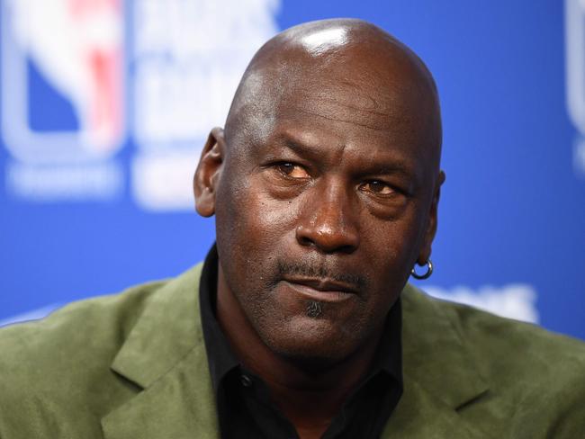 (FILES) In this file photo taken on January 24, 2020 former NBA star and owner of Charlotte Hornets team Michael Jordan looks on as he addresses a press conference ahead of the NBA basketball match between Milwaukee Bucks and Charlotte Hornets at The AccorHotels Arena in Paris. - Michael Jordan said June 5, 2020, he is making a record $100 million donation to groups fighting for racial equality and social justice amid a wave of protests across the United States. (Photo by FRANCK FIFE / AFP)