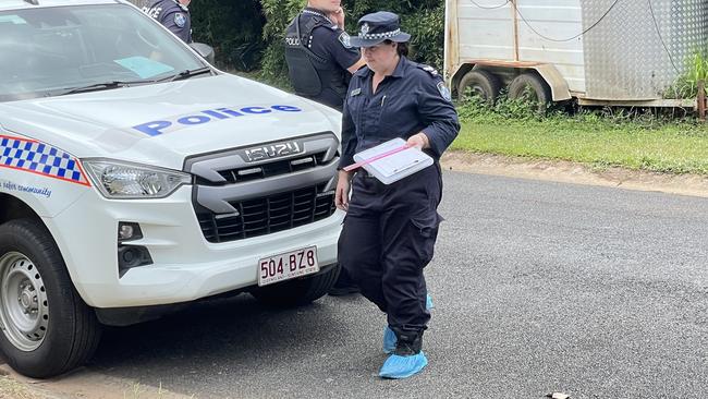 Forensic police officers at the scene of an alleged stabbing in Caravonica. Photo: Alison Paterson.