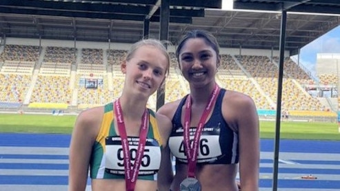 Zoe Chester of St Peters Lutheran College and Teresa Anthony of Moreton Bay College, 16 Years Triple Jump