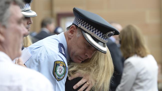 Family and friends of murdered policeman Bryson Anderson outside the Supreme Court, Sydney. Picture: Craig Wilson