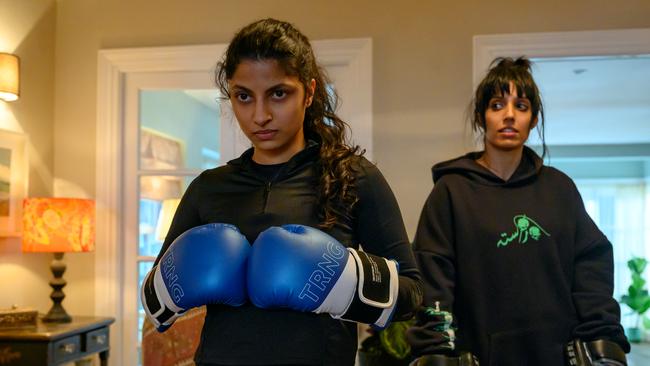 Priya Kansara stars as Ria Khan and Ritu Arya as her sister Lena in new film, Polite Society. Picture: Parisa Taghizadeh/2023 Focus Features LLC