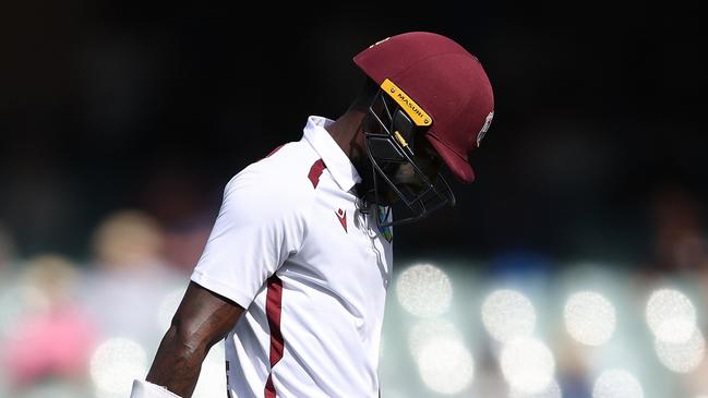 ADELAIDE, AUSTRALIA - JANUARY 18: Kirk McKenzie of the West Indies walks from the field after being dismissed by Cameron Green of Australia during day two of the First Test in the Mens Test match series between Australia and West Indies at Adelaide Oval on January 18, 2024 in Adelaide, Australia. (Photo by Paul Kane/Getty Images)