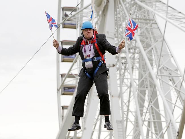 As London’s mayor in 2012, Boris Johnson hangs from a zip wire. Picture: Getty Images