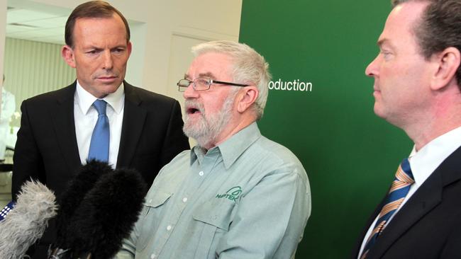 Johnson, centre, with former Prime Minister Tony Abbott and former Senator Christopher Pyne in 2012. Picture: Kelly Barnes.